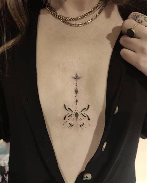 middle boob tattoo|Top 10 middle breast tattoo ideas and inspiration